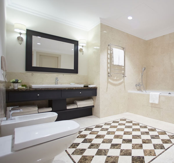 Framed mirror in home's bathroom.