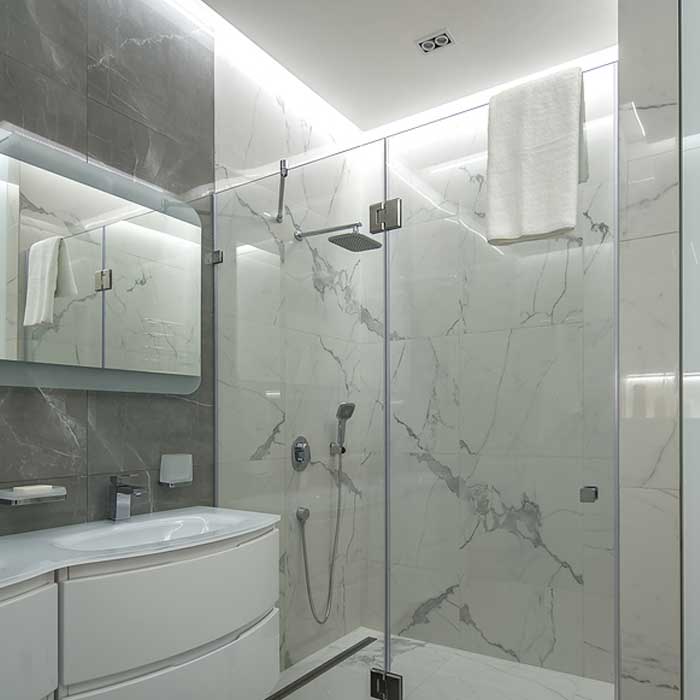 Custom shower door, installed in a home's bathroom.