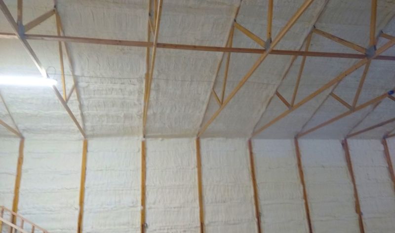Newly installed foam insulation in the wall and ceiling.