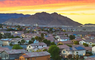 Aerial Las Vegas Residential Neighborhood Housing at Sunset with Spring Mountain View.