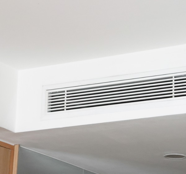 Air Condition, at white ceiling vent with sleek horizontal slats.